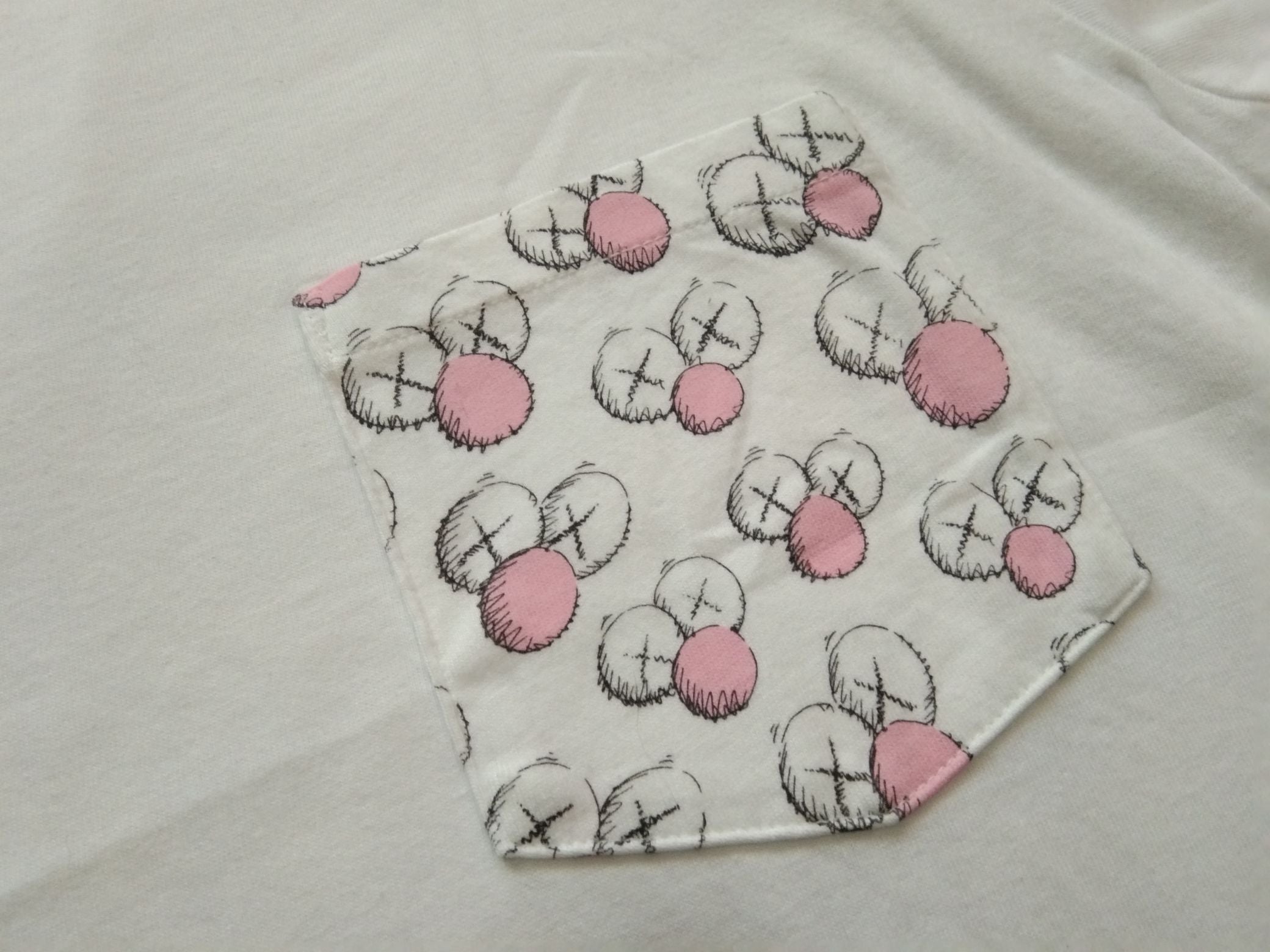 Like New Kaws Pocket Tee Tshirt Artist Designer Hoodie, Sweatshirt | FlexRushtees.com