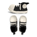 Bravest Studios Black Claymation Shoes In Hand