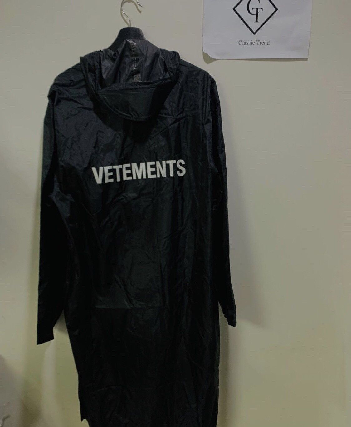 Vetements Logo Classic Raincoat T-Shirts, Hoodie, Sweatshirt | FlexRushtees.com