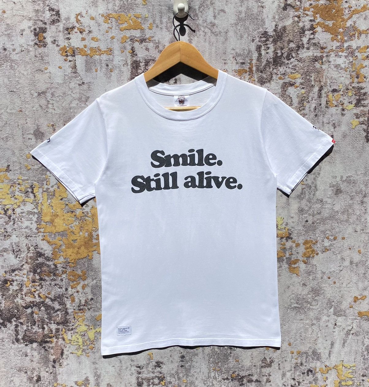 Wtaps Japanese Streetwear Shirt Wording Smile Still Alive Hoodie, Sweatshirt | FlexRushtees.com