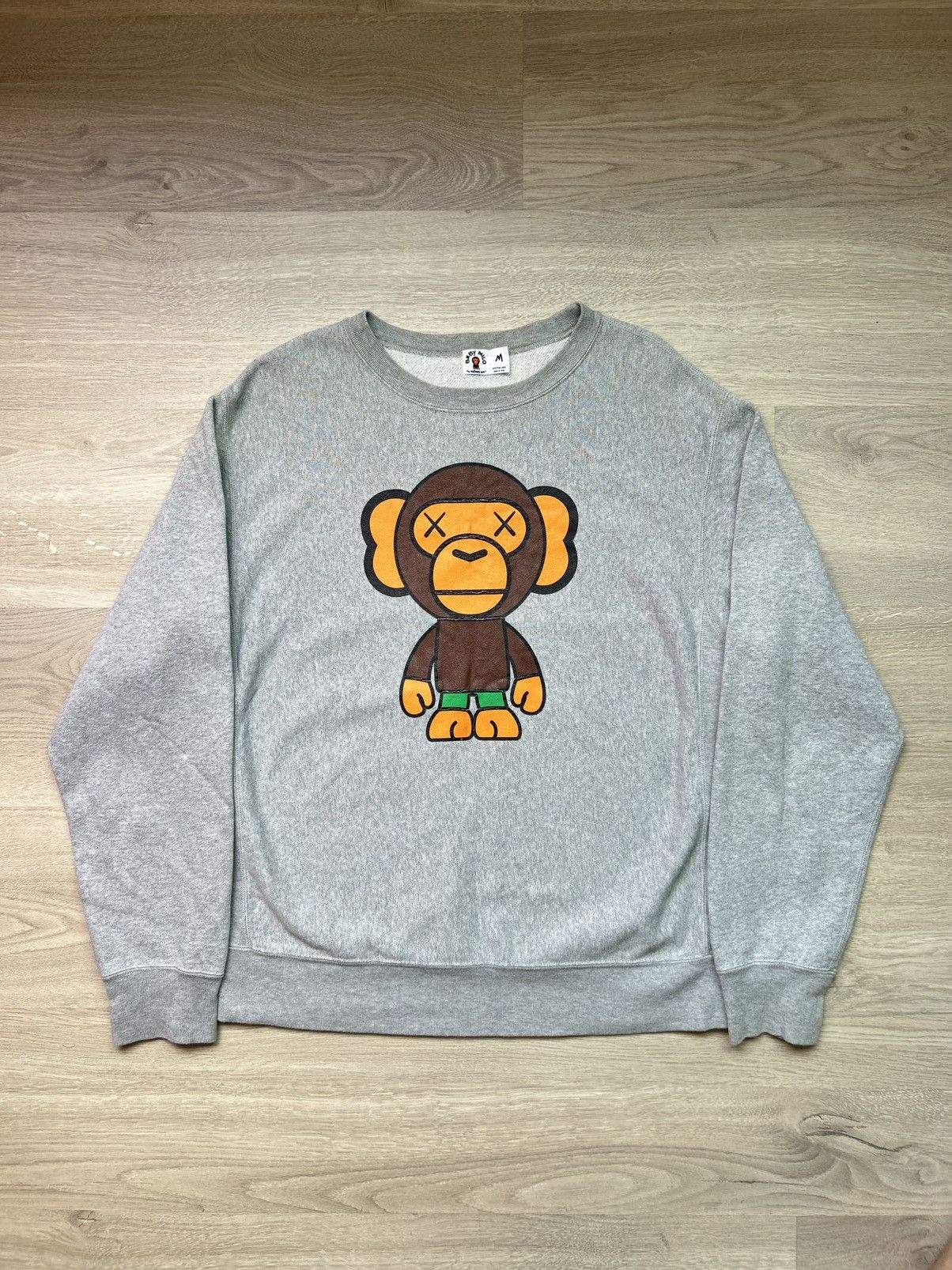 Kaws 2005 Bape X Kaws Baby Milo Grey Crewneck Sweatshirt T-Shirts, Hoodie | FlexRushtees.com