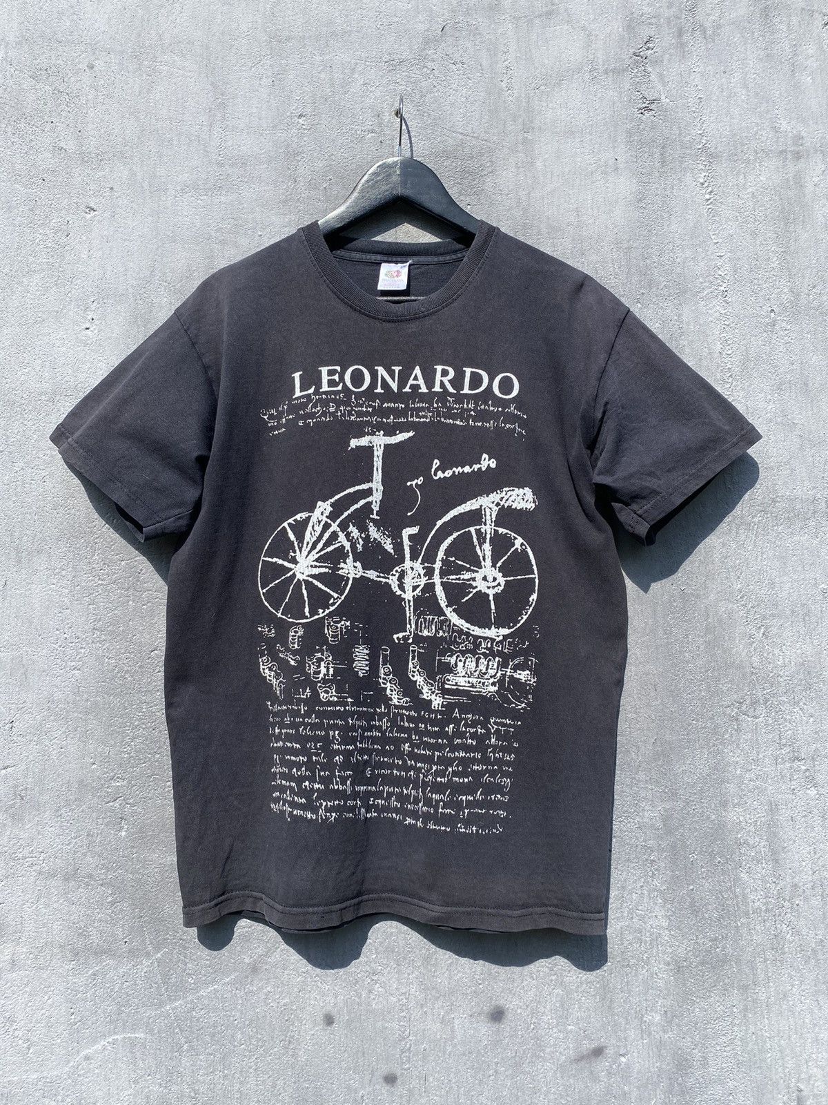 Vintage Vtg 90s Leonardo Da Vinci Paris Bike Art Tee T Shirt Faded Hoodie, Sweatshirt | FlexRushtees.com