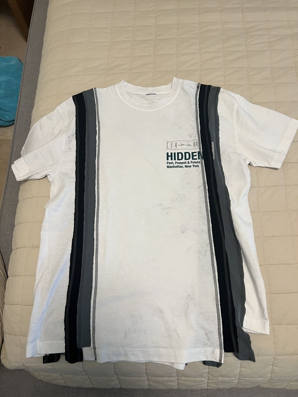 Hidden Ny Needles Rebuild 7 Cuts Tee
