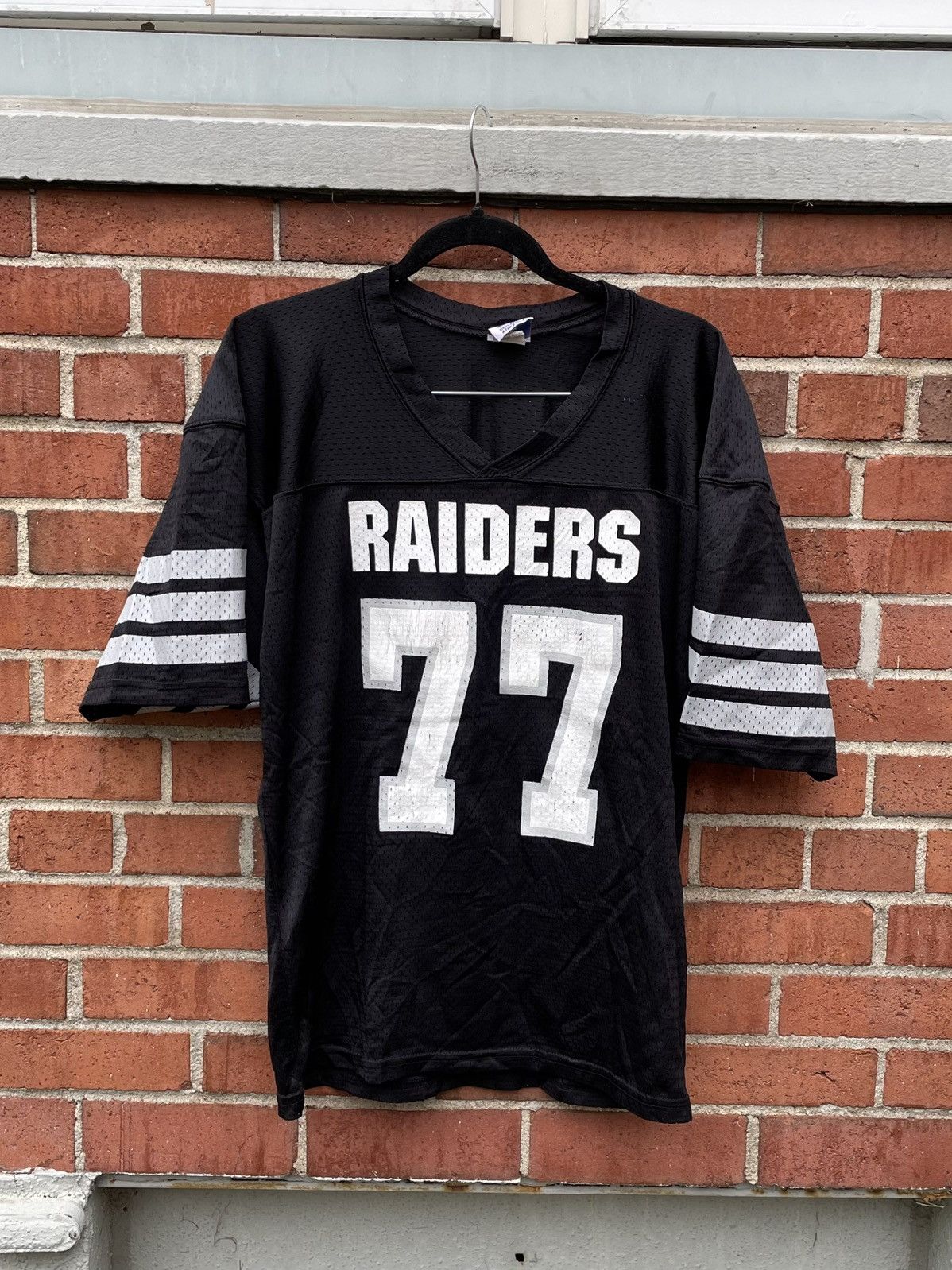 Vintage 90s Universal Athletics Raiders Football Jersey