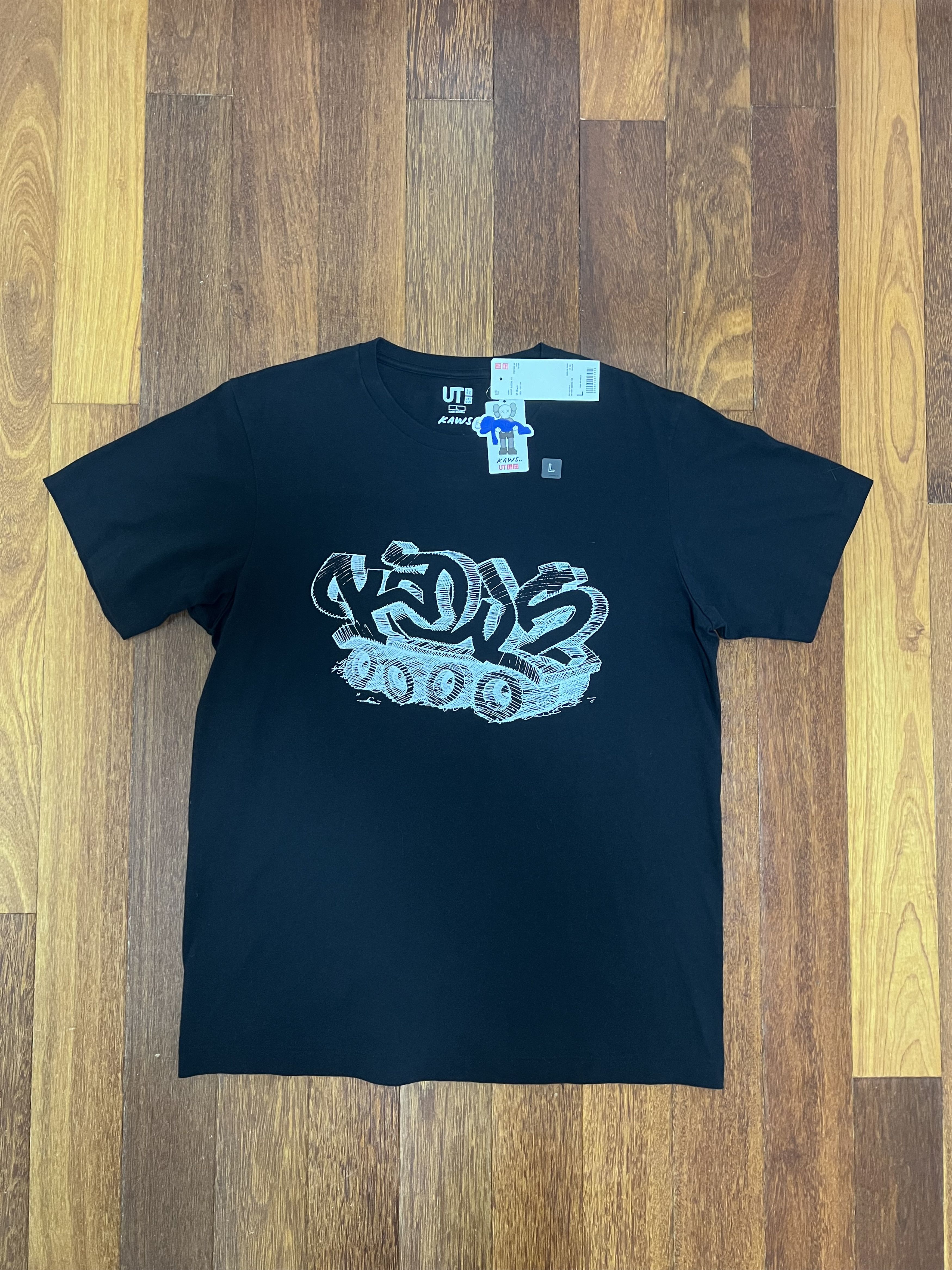 Kaws X Uniqlo Wordmark Tee Black Large New Hoodie, Sweatshirt | FlexRushtees.com