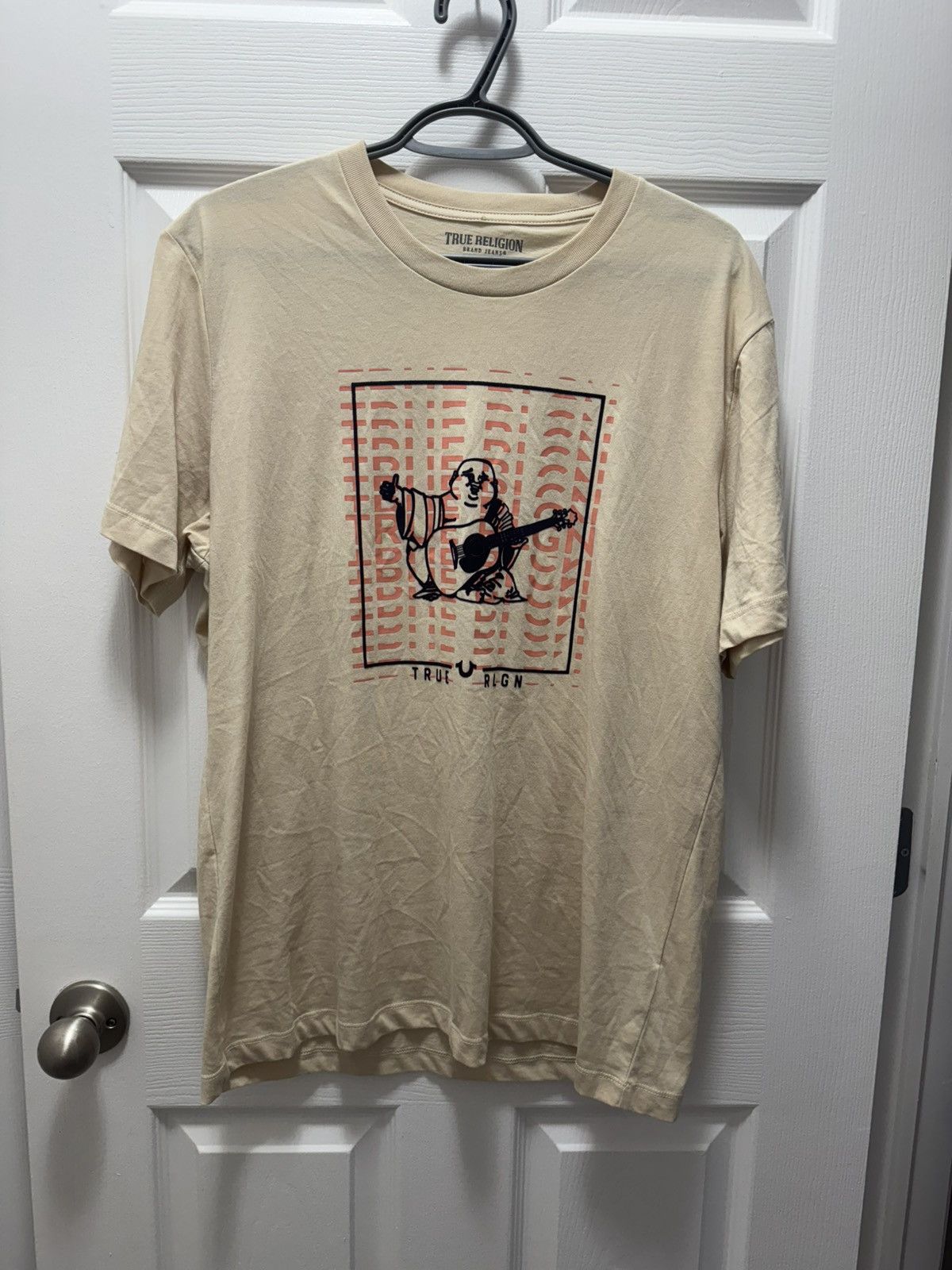 True Religion X Vintage True Religion Beige T Shirt Classic Logo Vintage Designer Hoodie, Sweatshirt | FlexRushtees.com