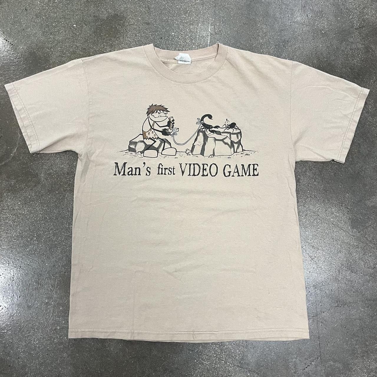 Vintage Vtg 2000s Man S First Video Comic Funny Graphic T Shirt Tan Hoodie, Sweatshirt | FlexRushtees.com