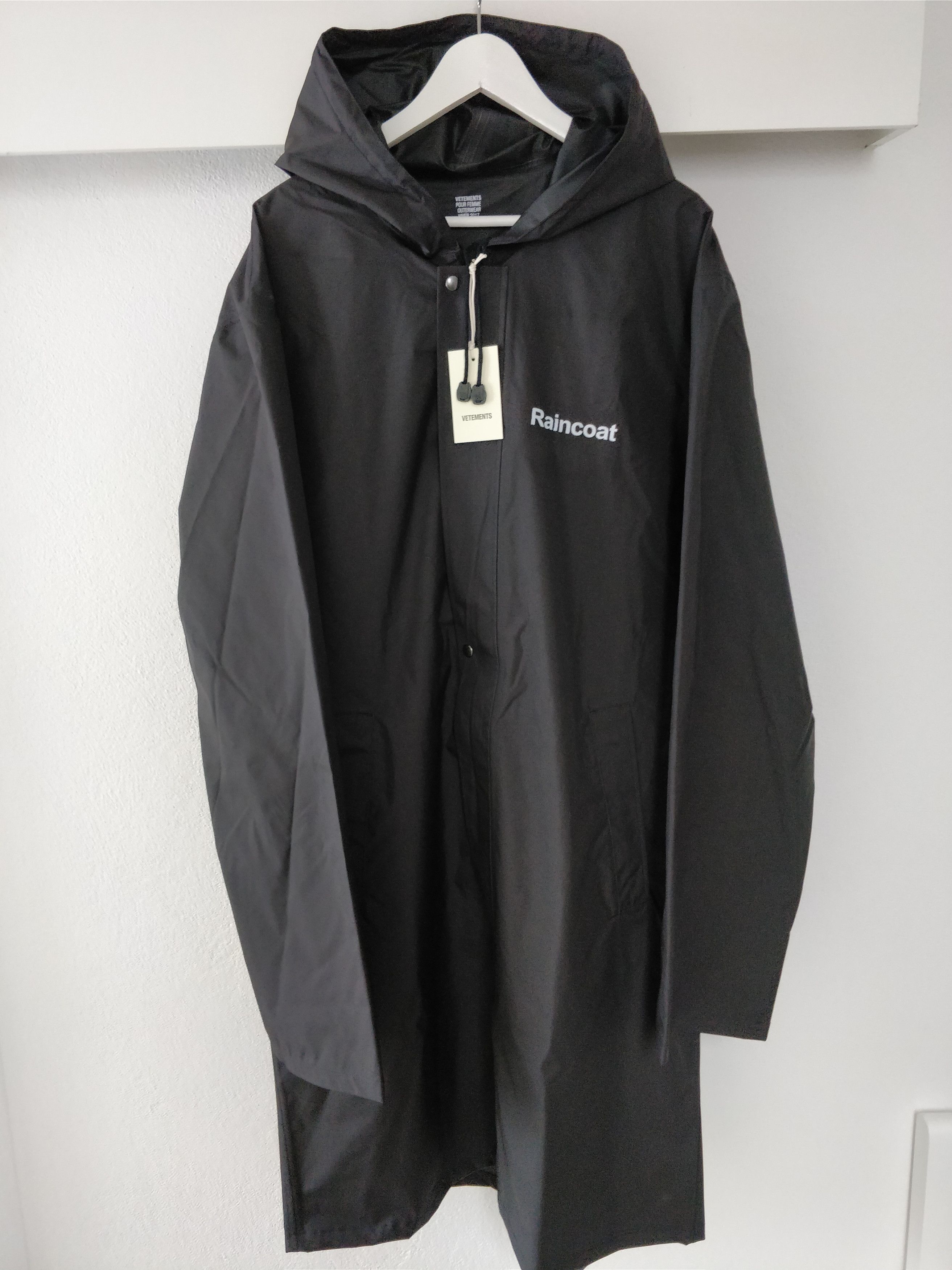 Vetements Official Fake Definition Raincoat T-Shirts, Hoodie, Sweatshirt | FlexRushtees.com