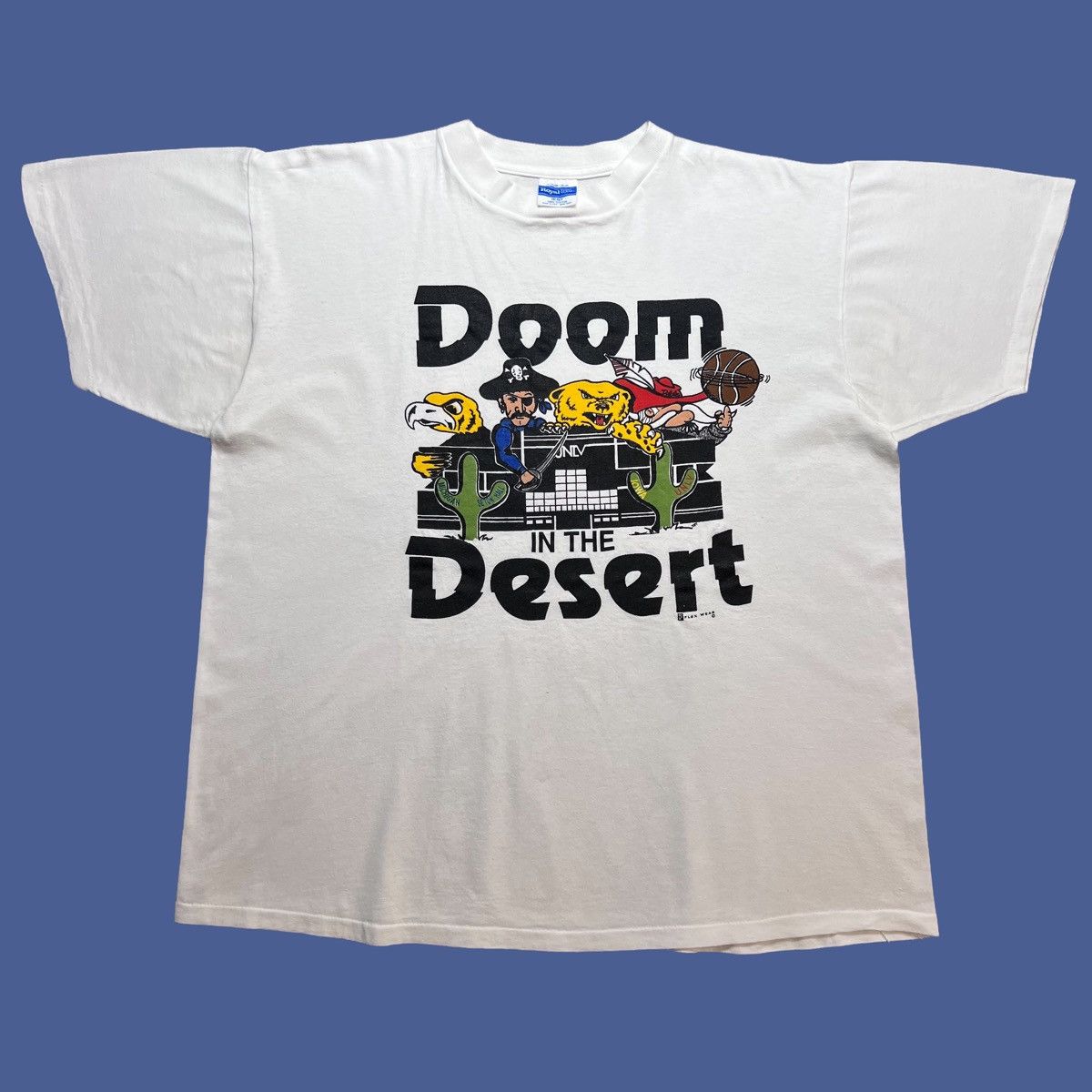 Vintage 1990s Ncaa Rebels Hawkeye Doom In The Desert T Shirt